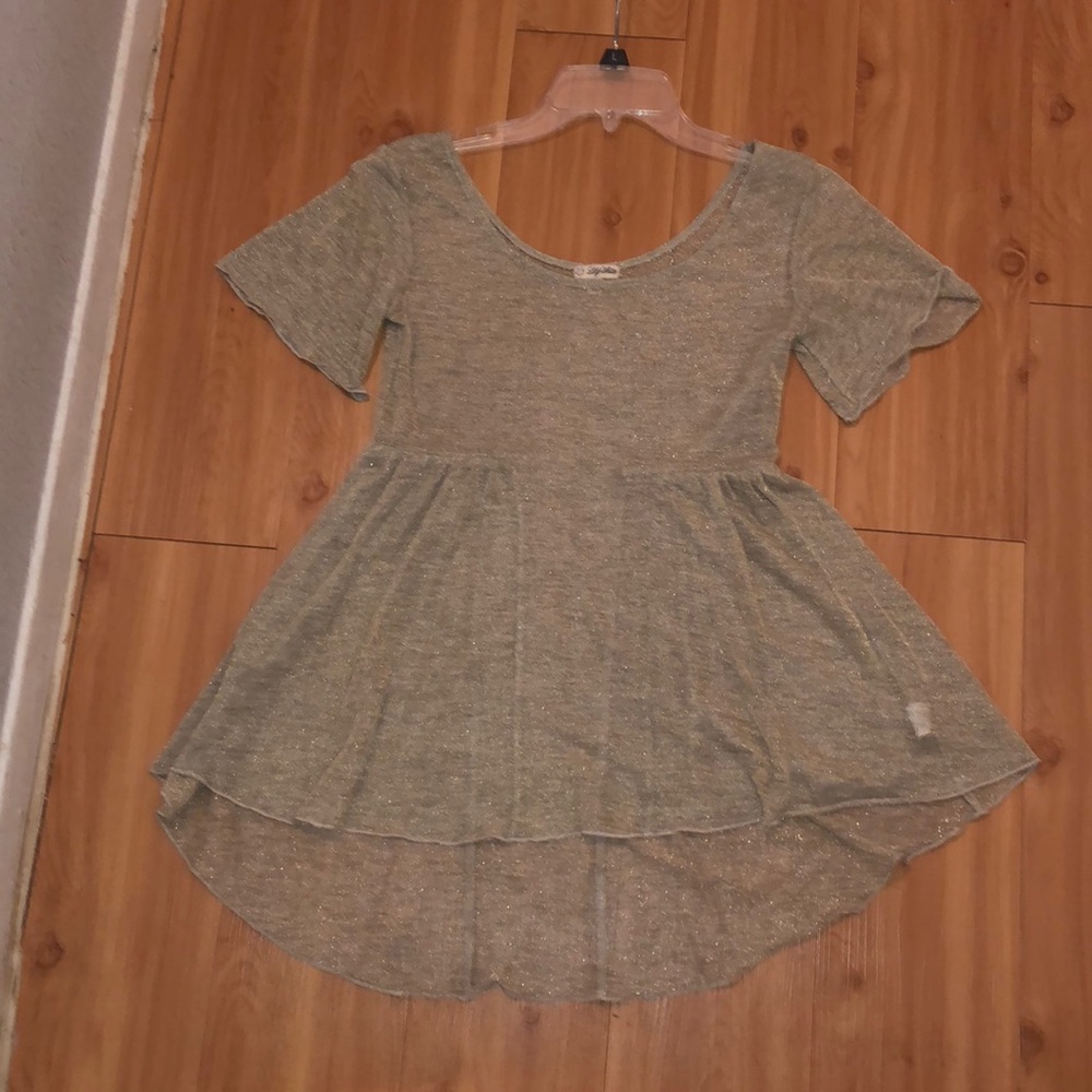 Sheer golden blouse with high low hem